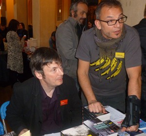 Ian Rankin signs books for fans.